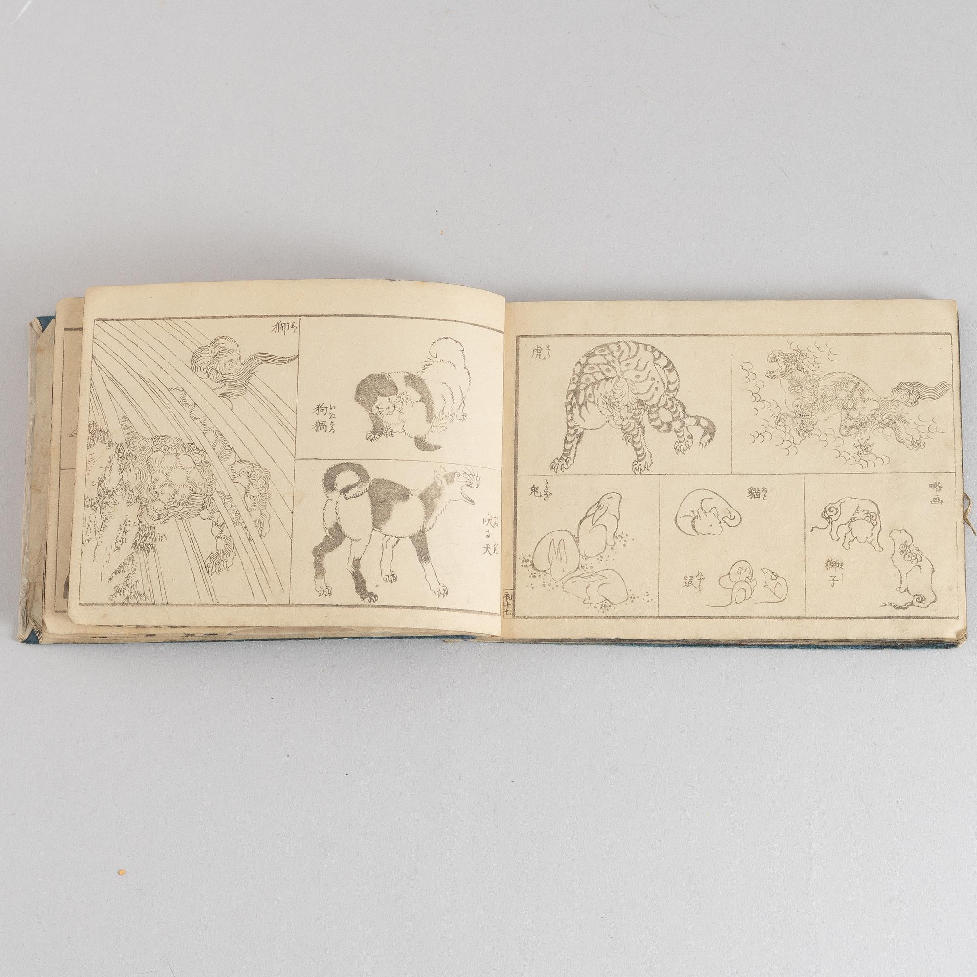 A group of five Japanese albums, including Katsushika Isai and Utagawa Kunisada, Meiji (1868-1912).