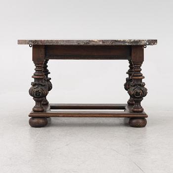 A 19th century Baroque style stone-top table.