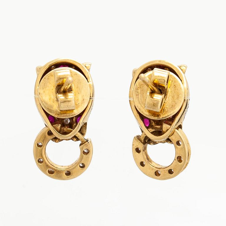 Korvakorut, 18K kultaa, rubiineja ja timantteja.