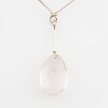 Vivianna Torun Bülow-Hübe, a neck ring no. 160 with pendant no. 131 in rutilated quartz, sterling silver, for Georg Jensen, Denmark.