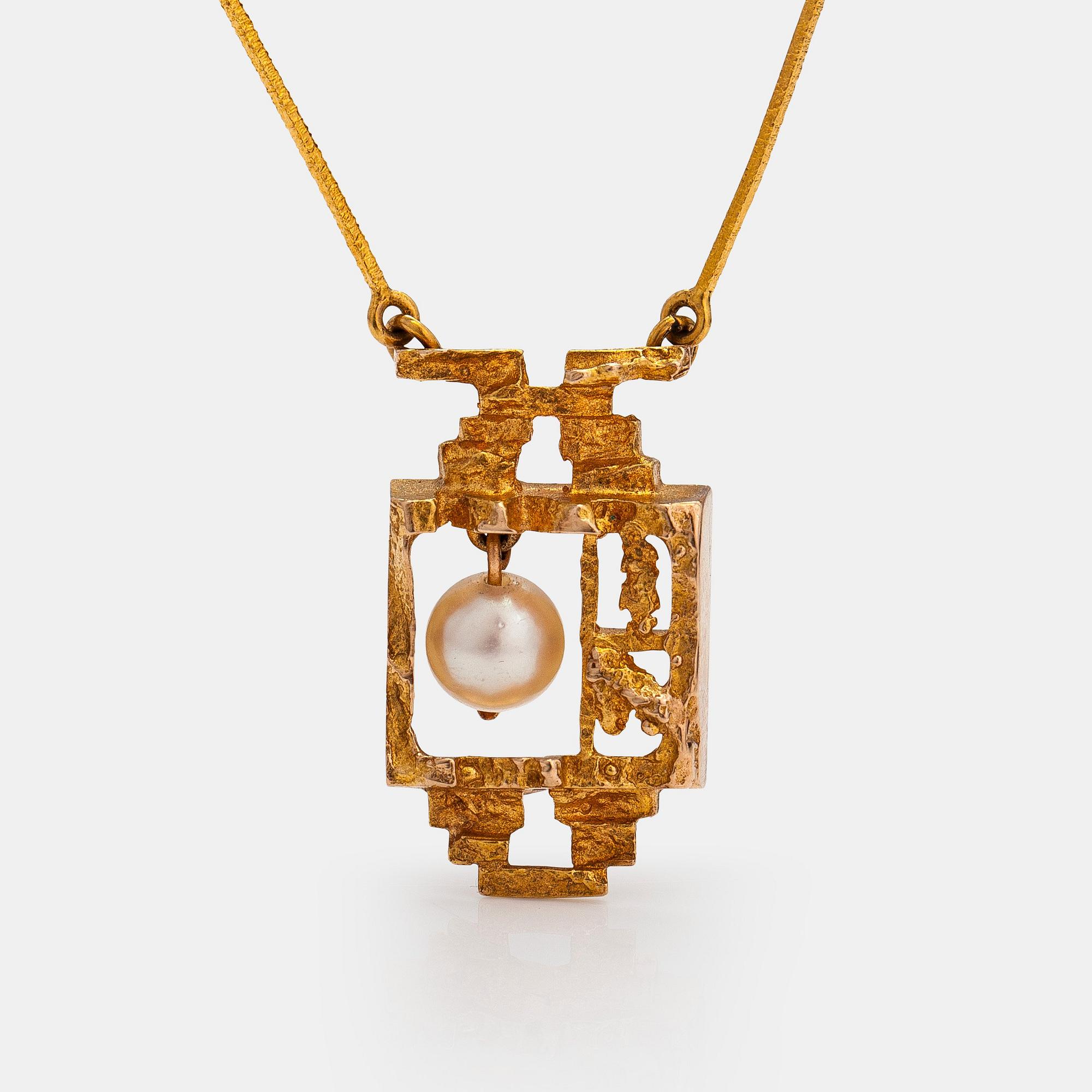 Björn Weckström, "Magic pearl", an 14K gold necklace with a cultured pearl. Lapponia 1972.