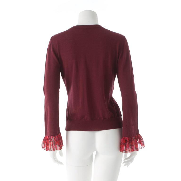 BURBERRY, a burgundy red merino wool cardigan.