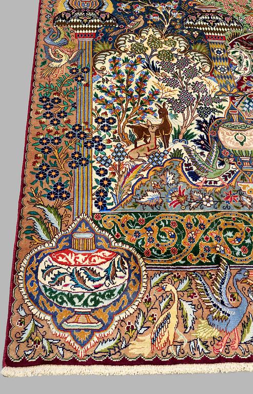 A Kashmar figural carpet. Circa 390 x 300 cm.