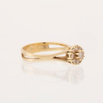 An 18K yellow gold Carmosé ring set with round brilliant-cut diamonds.