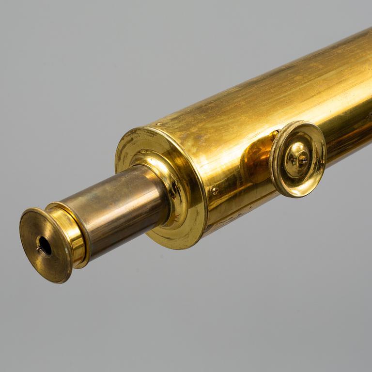 A brass telescope, circa 1900.