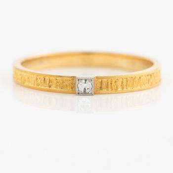 Lapponia ring 18K guld med en åttkantslipad diamant, Finland 1978.