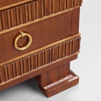 Oscar Nilsson, attributed to, a mahogany chest of drawers, Sweden 1930's.