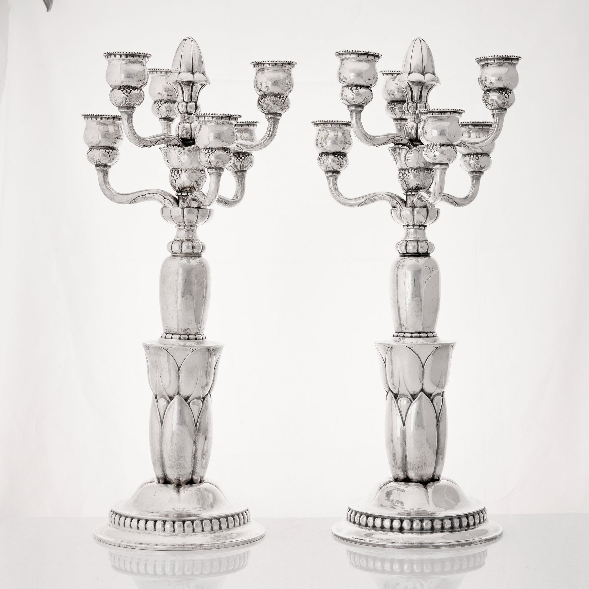 Georg Jensen, a pair of six lights silver candelabra, Copenhagen 1920, design nr 38.