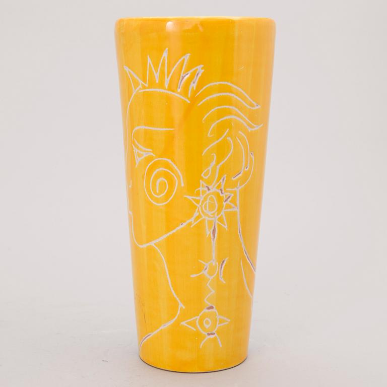 A ceramic vase, signed and dated with a dedication.