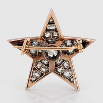 Brosch i form av stjärna silver och 14K guld med gammalslipade diamanter.