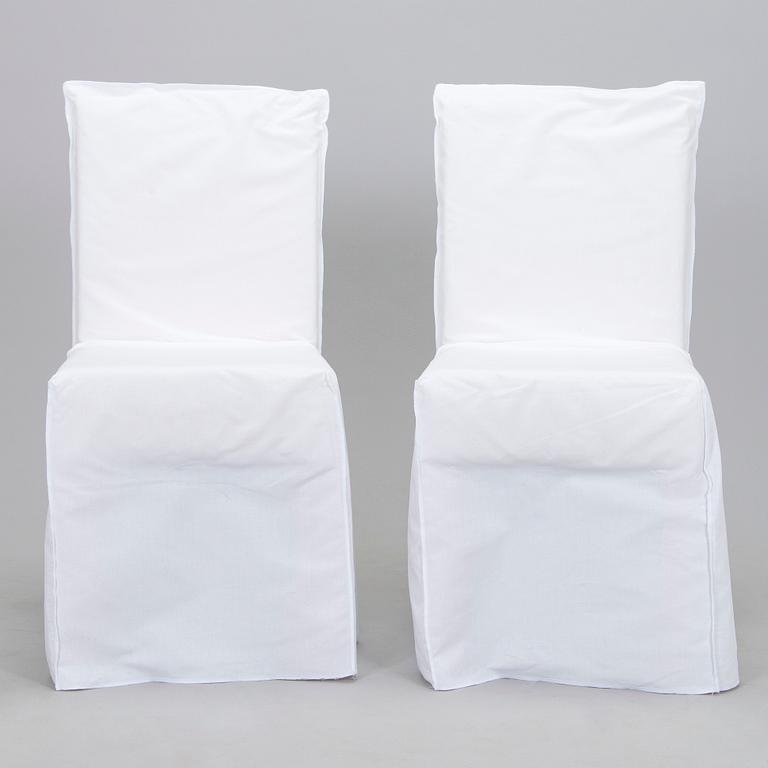 Paola Navone, A set of four dining chairs 'Ghost 23', Gervasoni Italy.