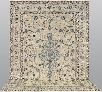 A carpet, Keshan, approx. 408 x 290 cm.