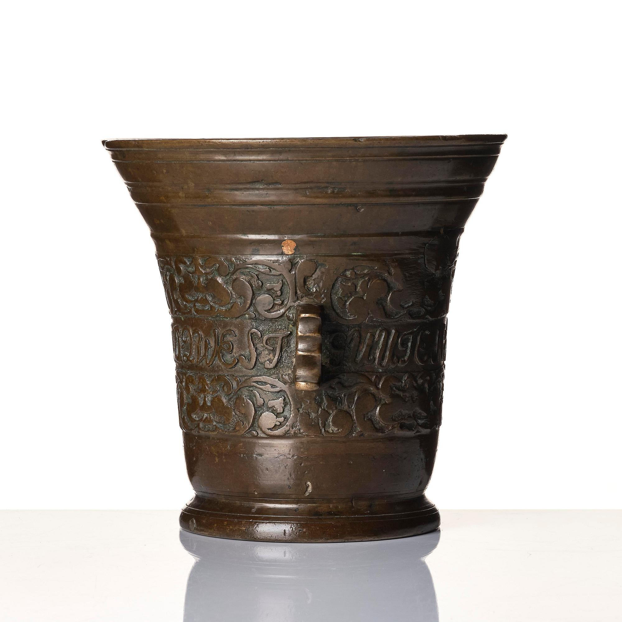 A Swedish late baroque bronze mortar and pestle, dated 1759.