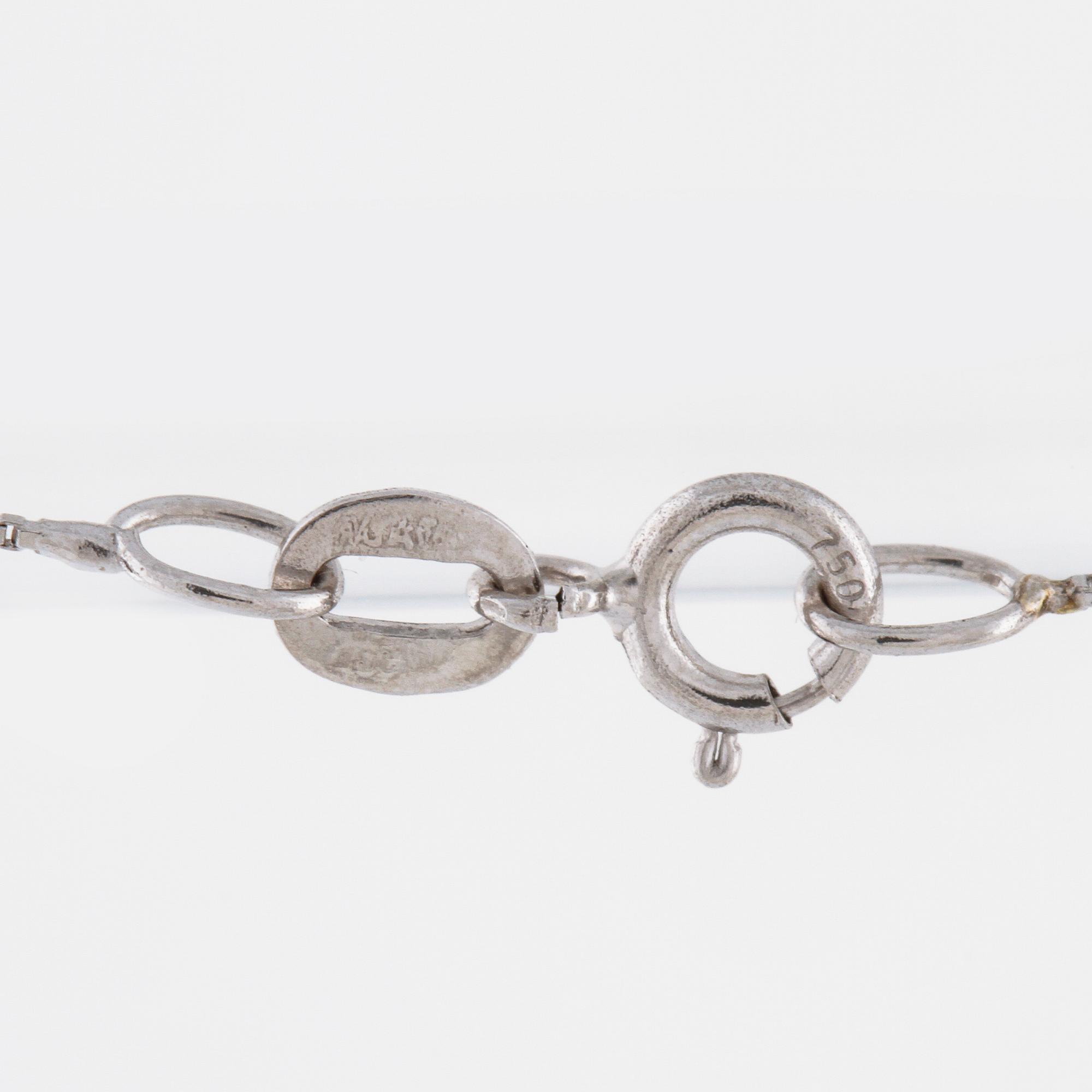 A aquamarine and briliant cut diamond pendant.