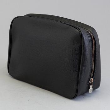 TAIGA TOILETRY POUCH GM, Louis Vuitton.