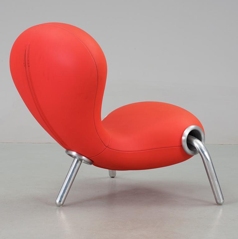 A Marc Newson coral red neoprene 'Embryo Chair,