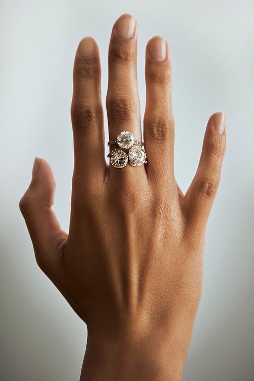 A platinum ring set with an old-cut diamond.