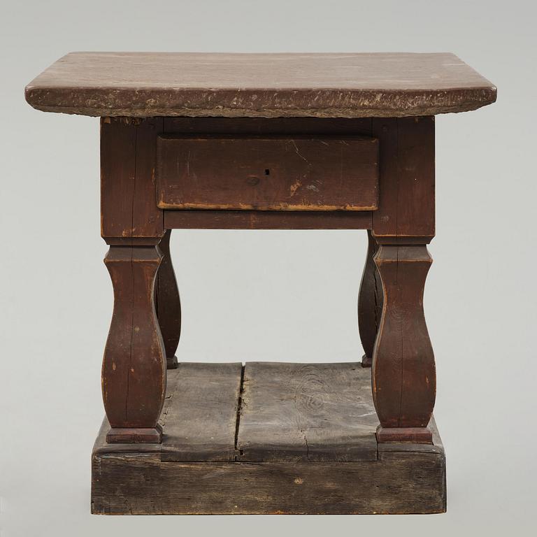 A Swedish baroque stone-top table, 18th century.