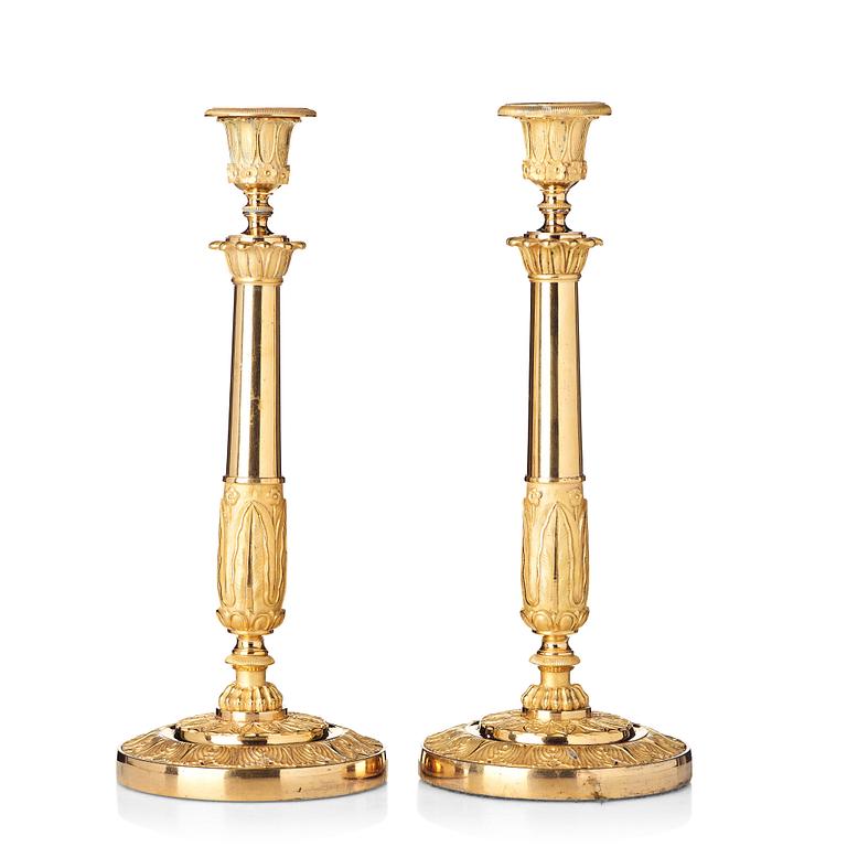 A pair of French Empire candlesticks, early 19th century.