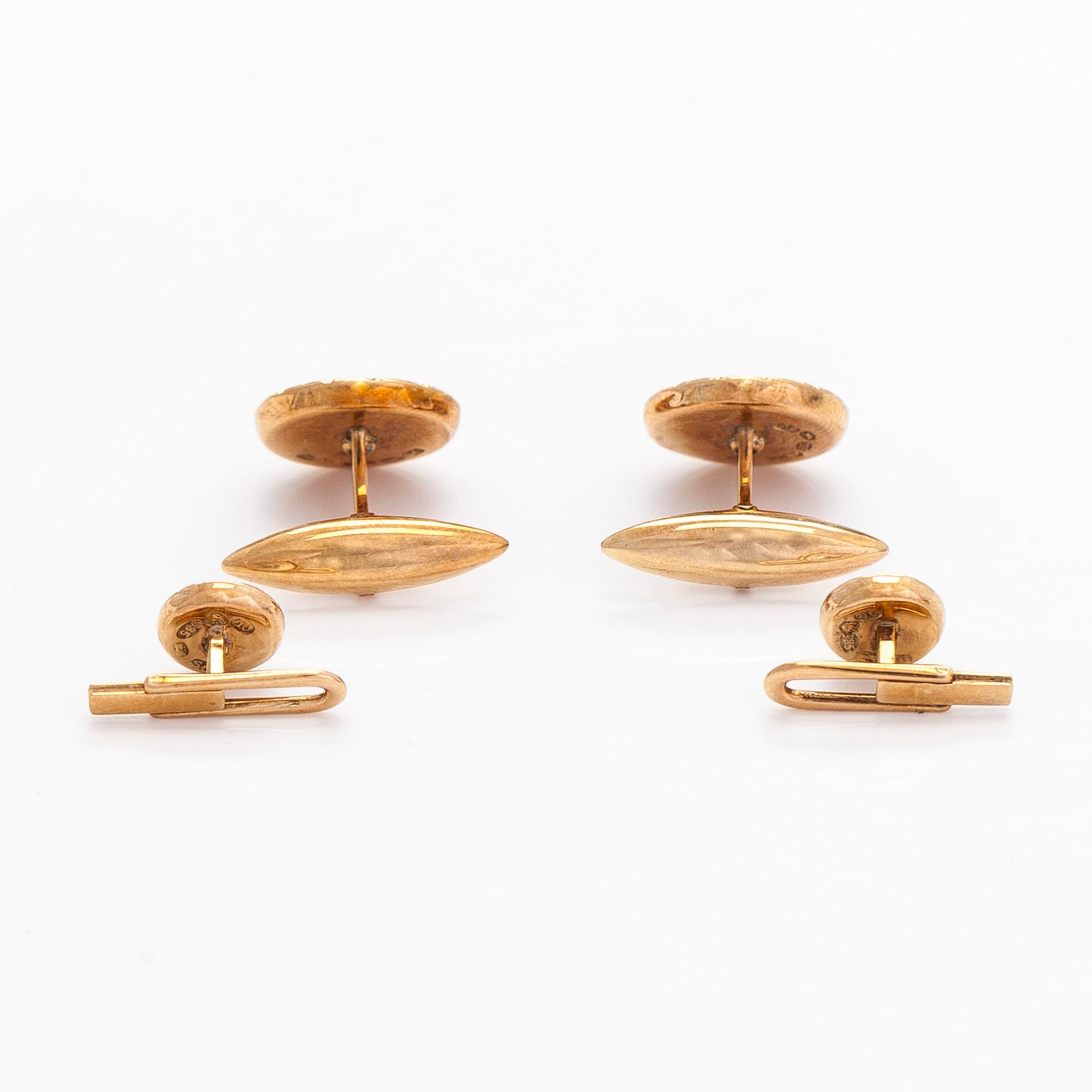 Cufflinks and shirt buttons, 14K gold, mother-of-pearl. Lindroos, Helsinki 1947.