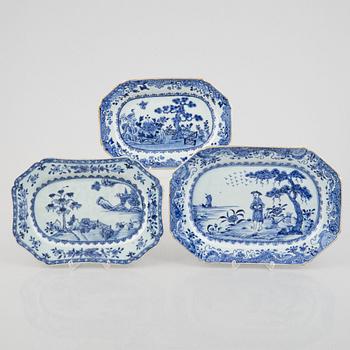 A set of three odd blue and white serving dishes, Qing dynasty, 18th century.