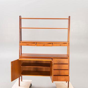 A teak mid 1900s book shelf.