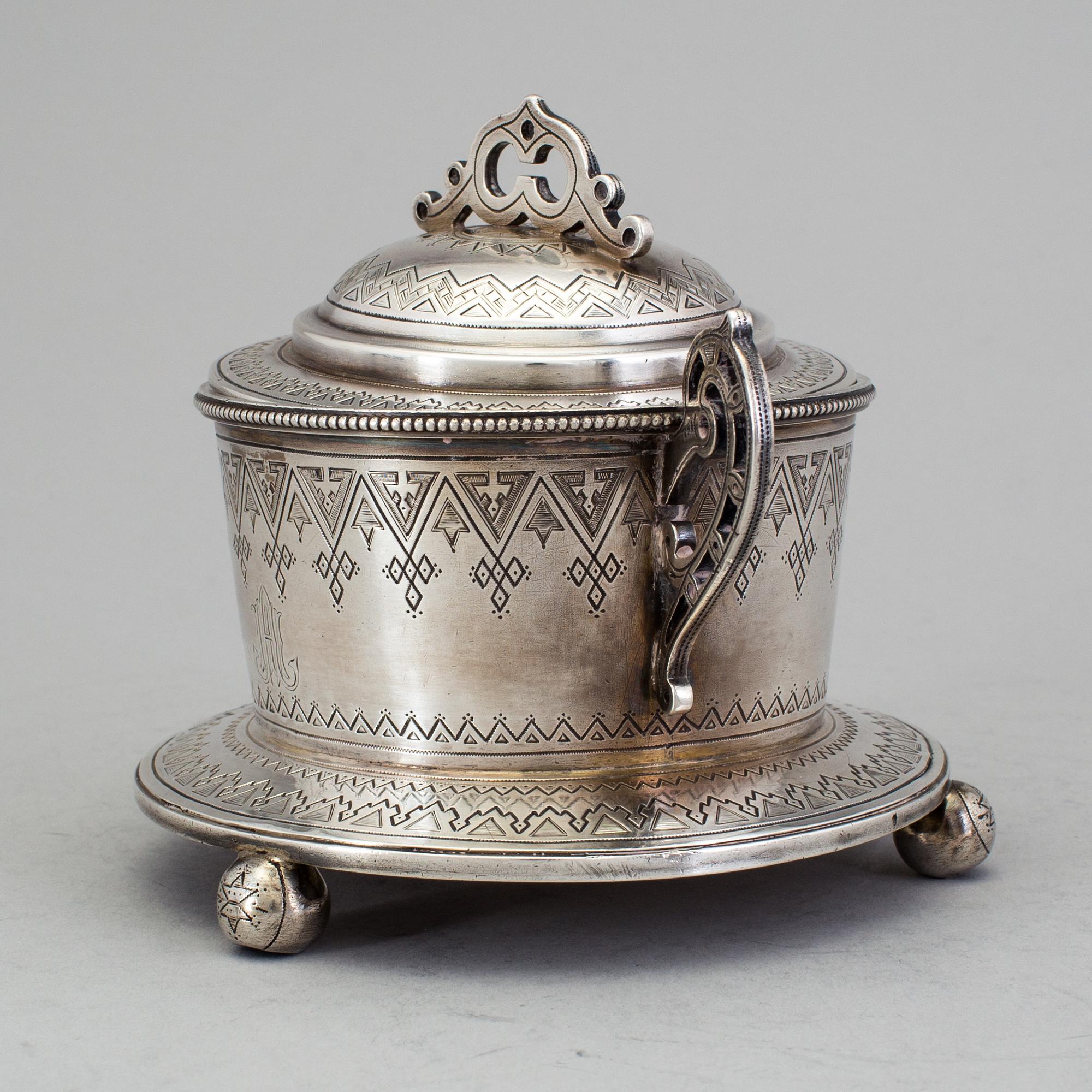 A Russian 19th century parcel-gilt sugar-casket, unidentified makers mark, St. Petersburg 1877.