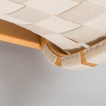 Alvar Aalto, a pair of late 20th century armchair model 406 Artek.