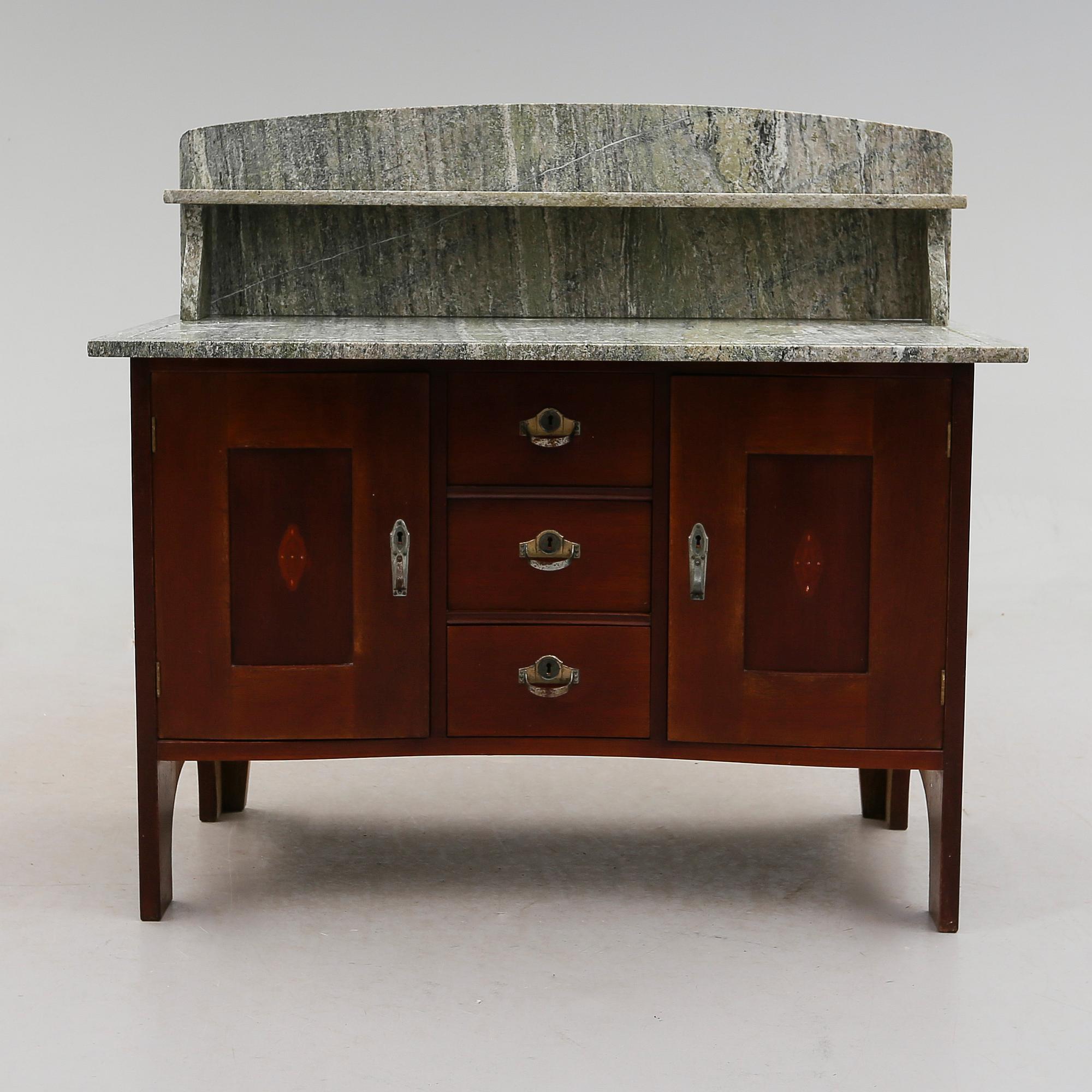 KOMMOD, 1900-talets första hälft.