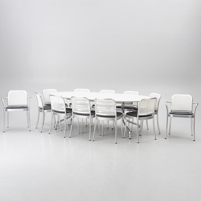 Vico Magistretti, a "Shine" dining table with twelve chairs, De Padova, Italy, around the year 2000.