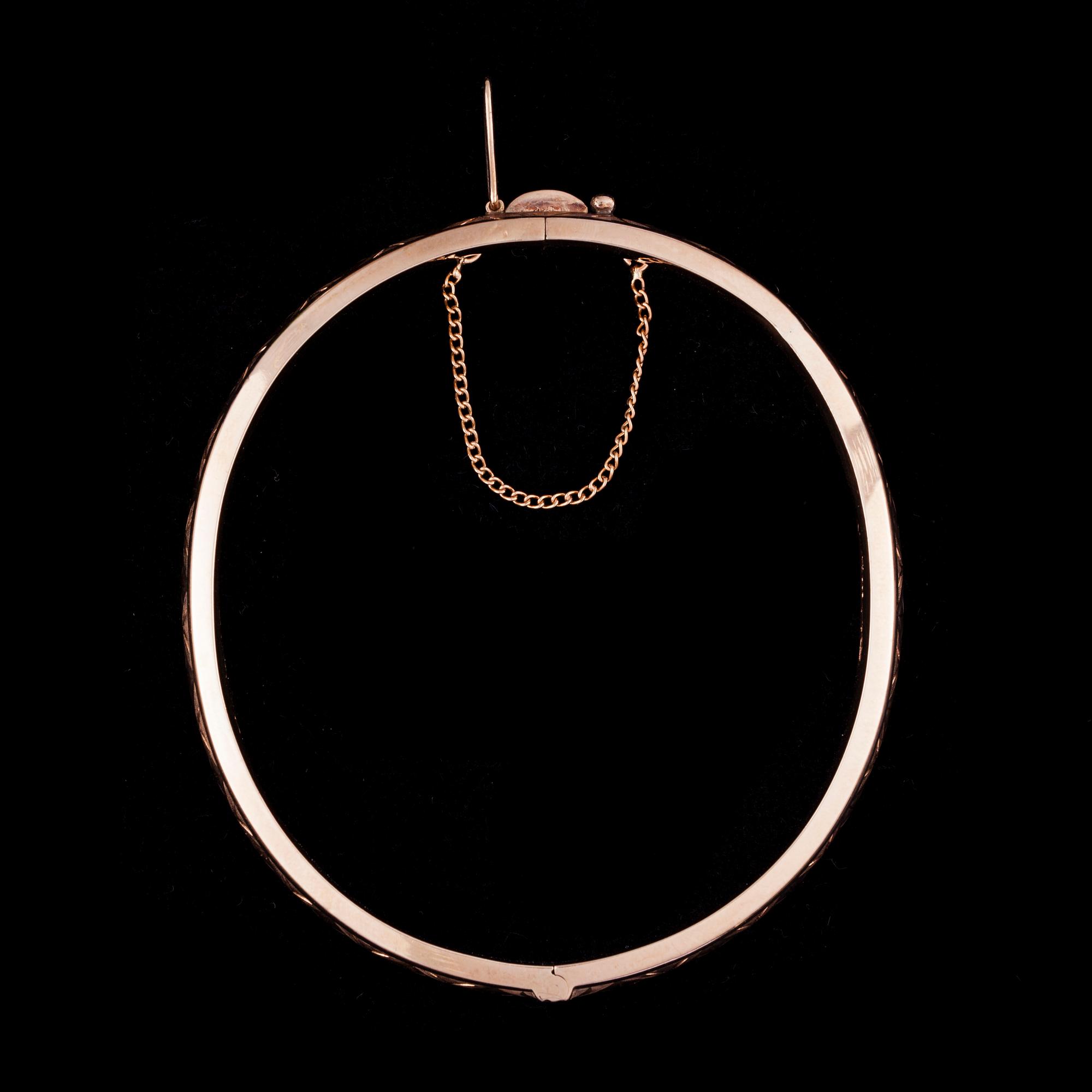 ARMRING, 14K guld, finska stämplar JJH, Helsingfors 1963. Vikt ca 14,3 g.