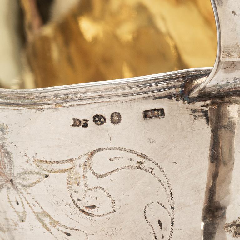 A Swedish Gustavian parcel-gilt silver sauce jug, mark of Daniel Hallman, Stockholm 1810.