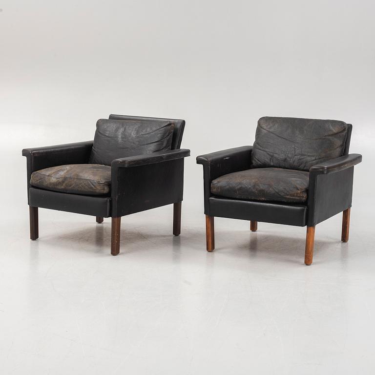 A pair of leather armchairs, Mio, Sweden, 1960's.