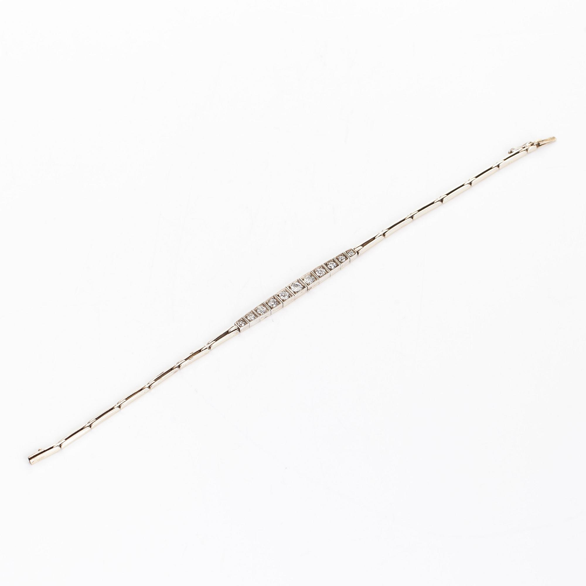 A ca 14K gold/silver bracelet, with diamonds total approx 0.92 ct, Moscow 1927-46.