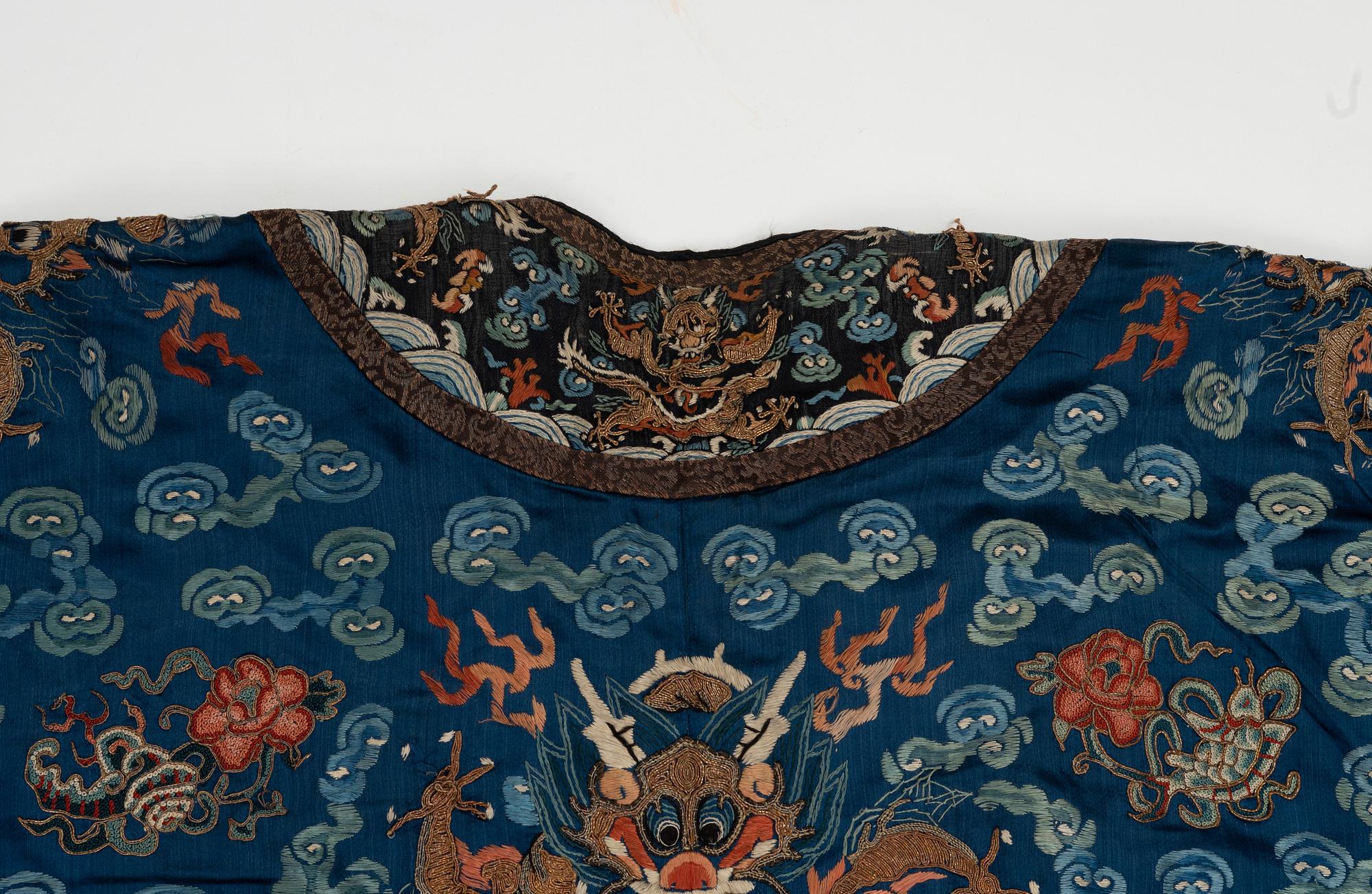 A Chinese embroidered silk robe, Qing dynasty, 19th Century.