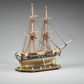 An Anglo-French early 19th century carved bone "Prisoner of War" 40 gun ship model.