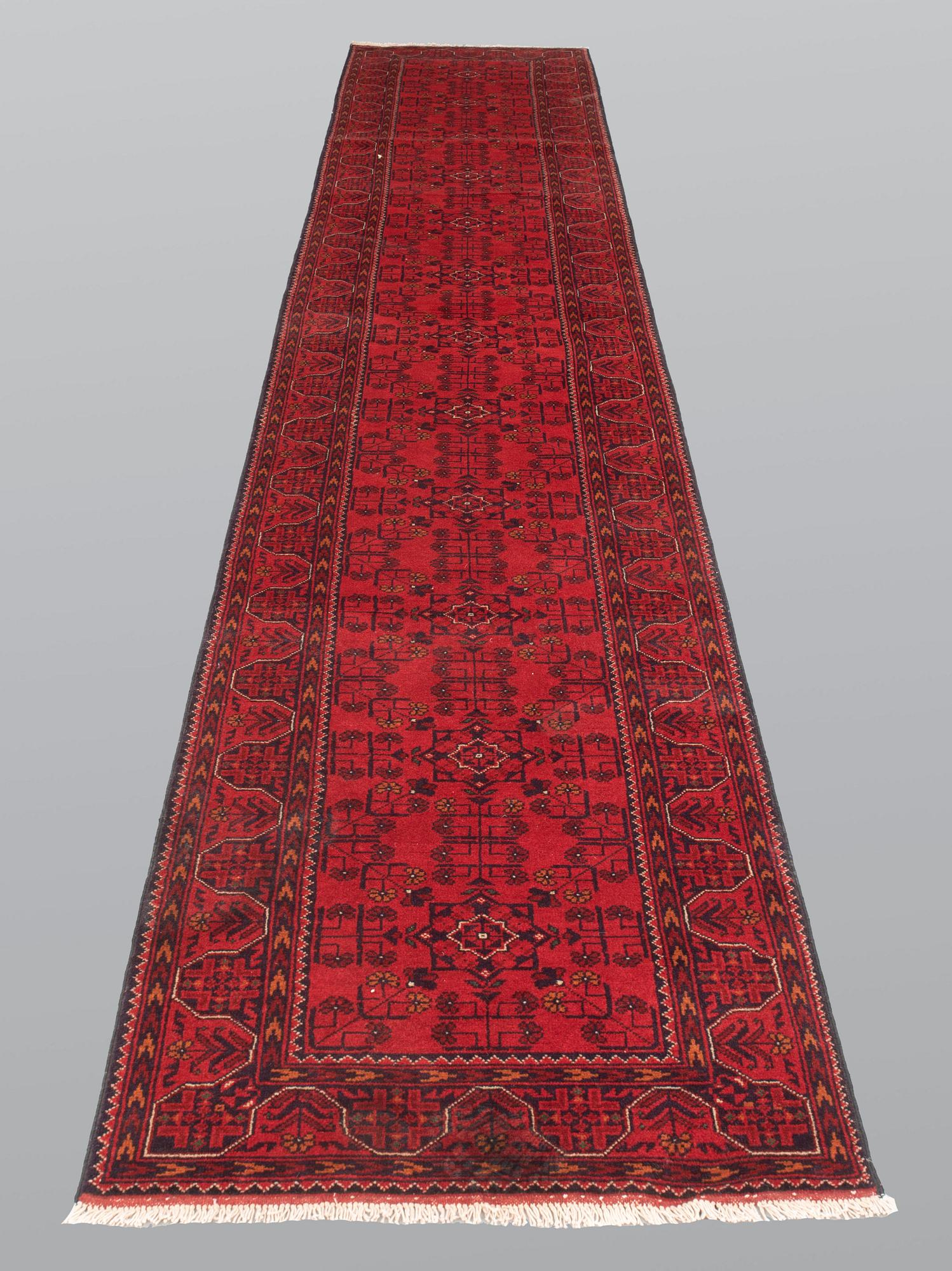 A runner, Afghan s.k khan mohammadi, ca 486 x 79 cm.