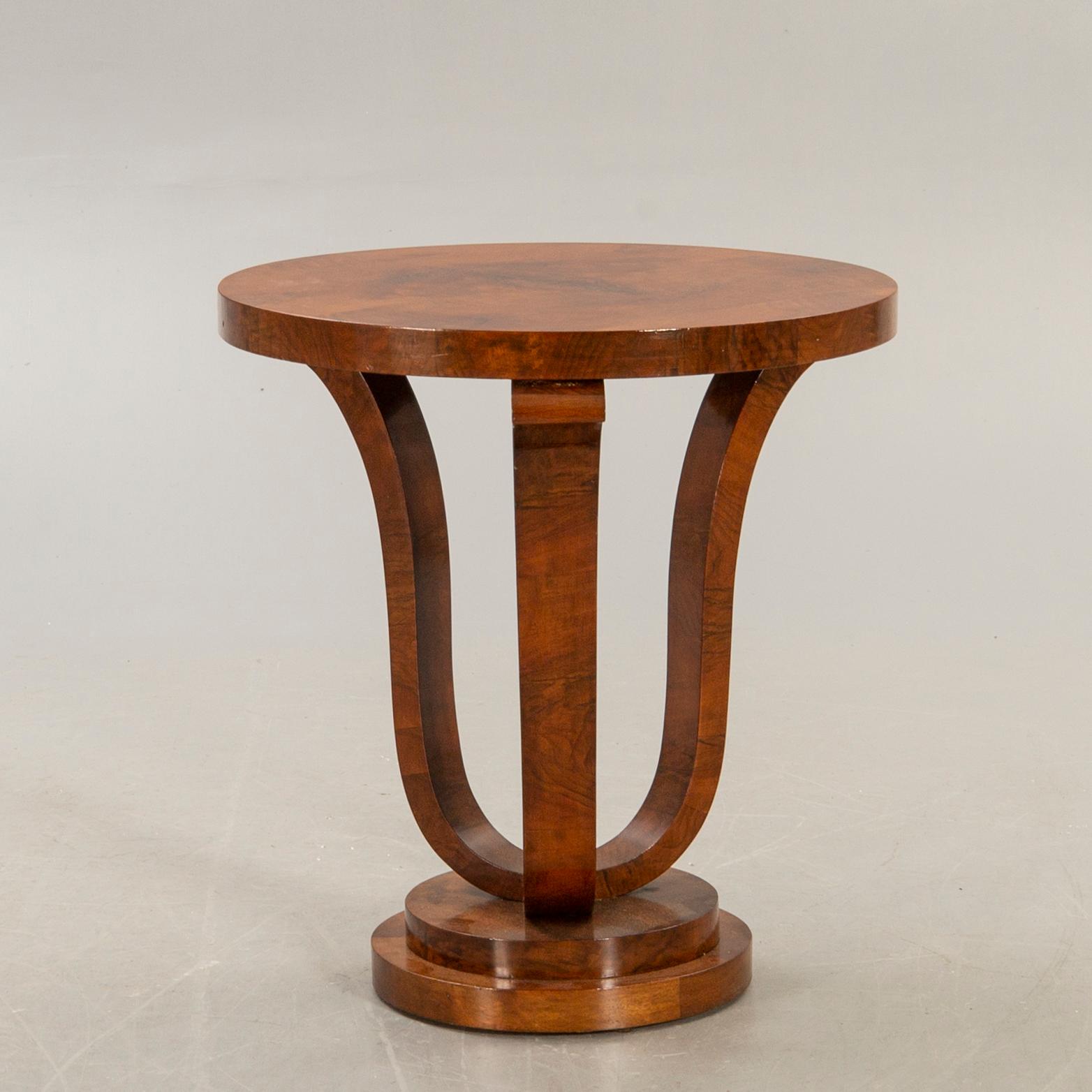 A walnut Art Deco style side table alter part of the 20t  century.