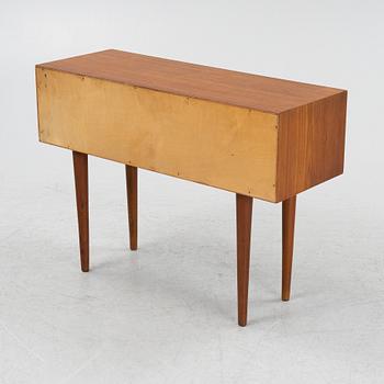 Kai Kristiansen, a teak veneered chest of drawers, Feldballes, Denmark, mid 20th century.