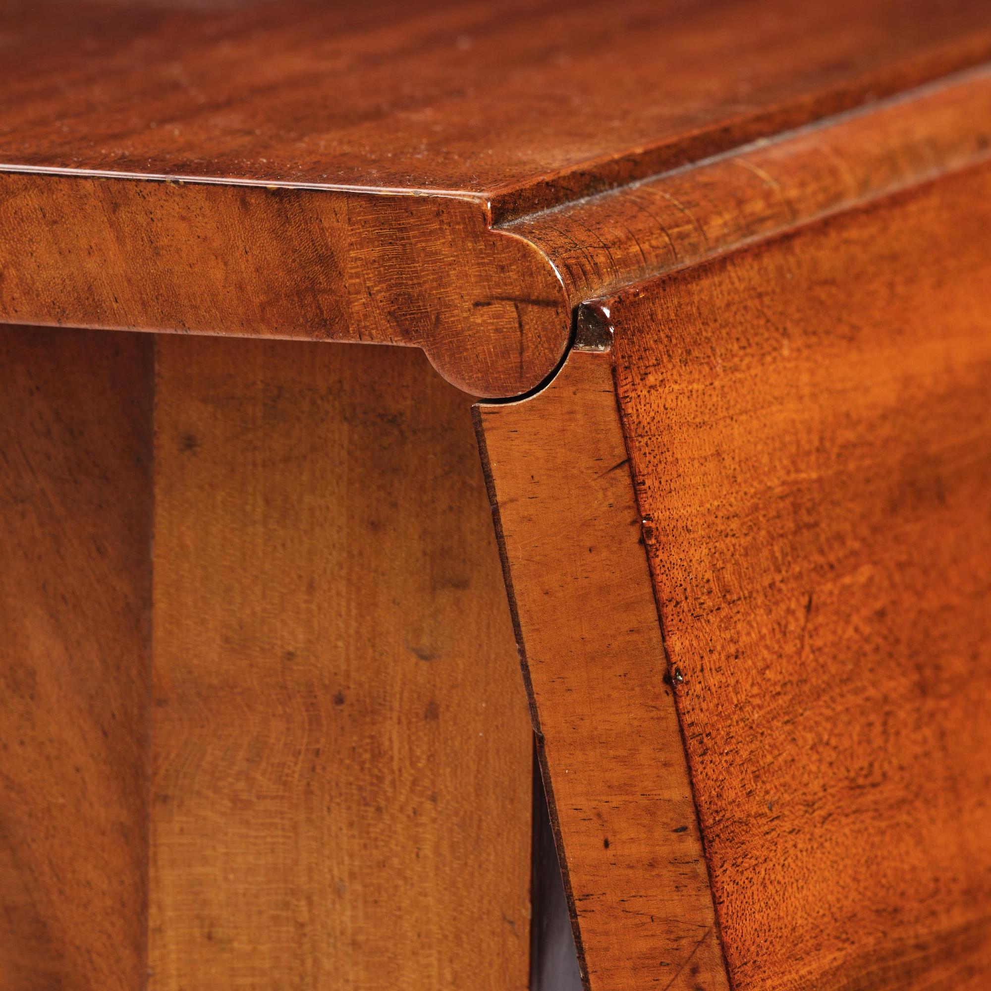 A Swedish Empire mahogany center table.