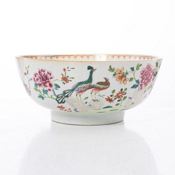 A famille rose 'double peacock' punch bowl, Qing dynasty, Qianlong (1736-95).