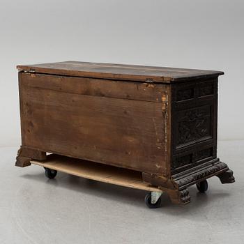 A 19th century baroque style oak chest.