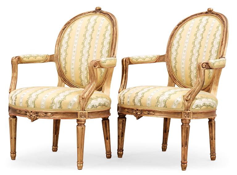 A pair of Gustavian 18th century armchairs.