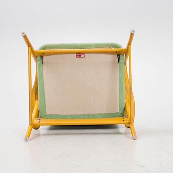 Alf Svensson, a "Contour-Set 327" armchair with ottoman, Ljungs Industrier, Sweden, 1950's.