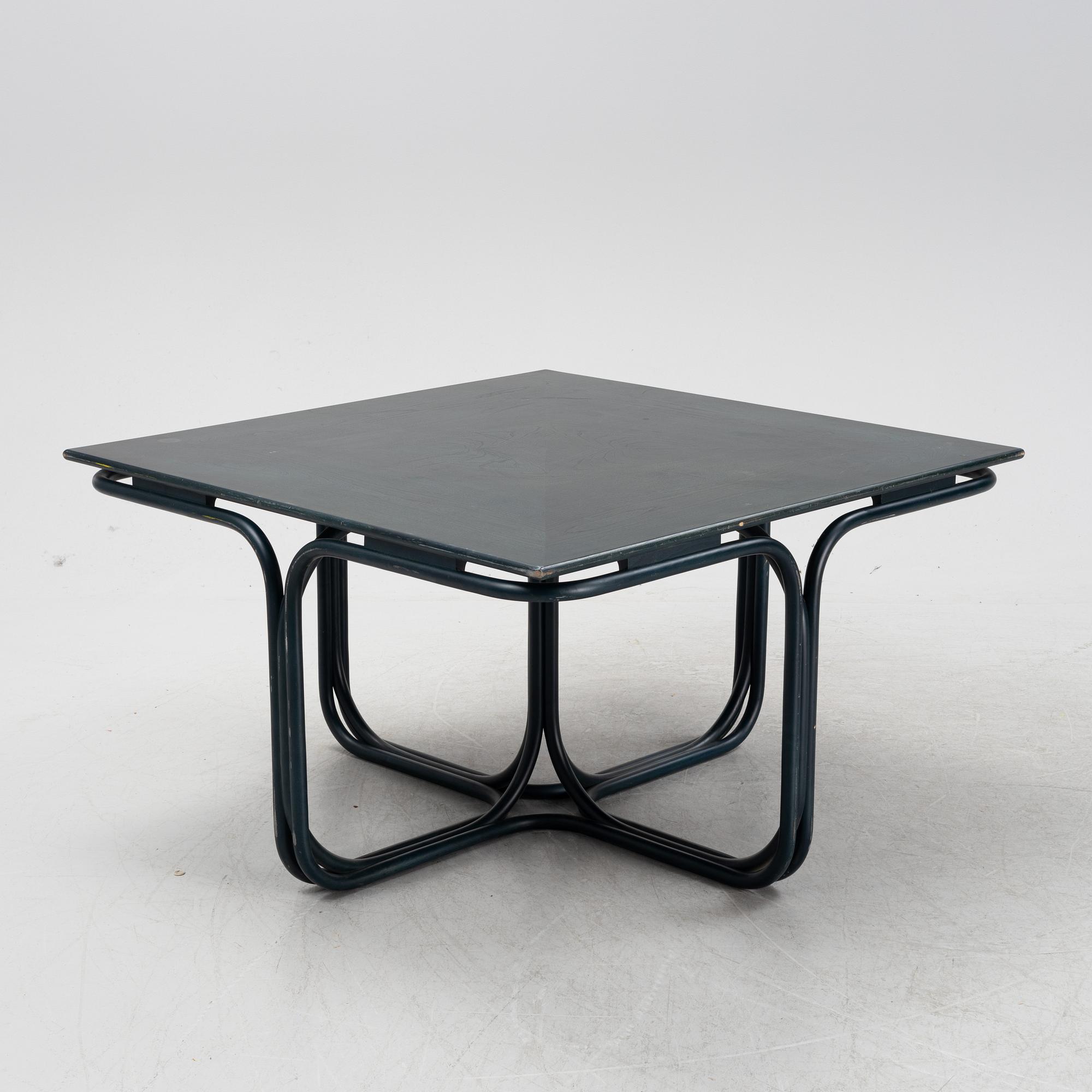 Jan Bocan, a stained beech dining table, late 20th Century.