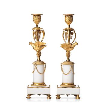 103. A pair of Louis XVI late 18th century candlesticks.