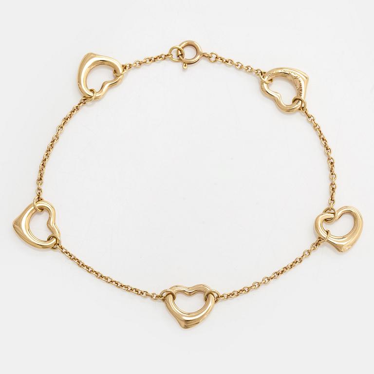 Tiffany & Co, Elsa Peretti, an 18K gold 'Open Heart' bracelet.