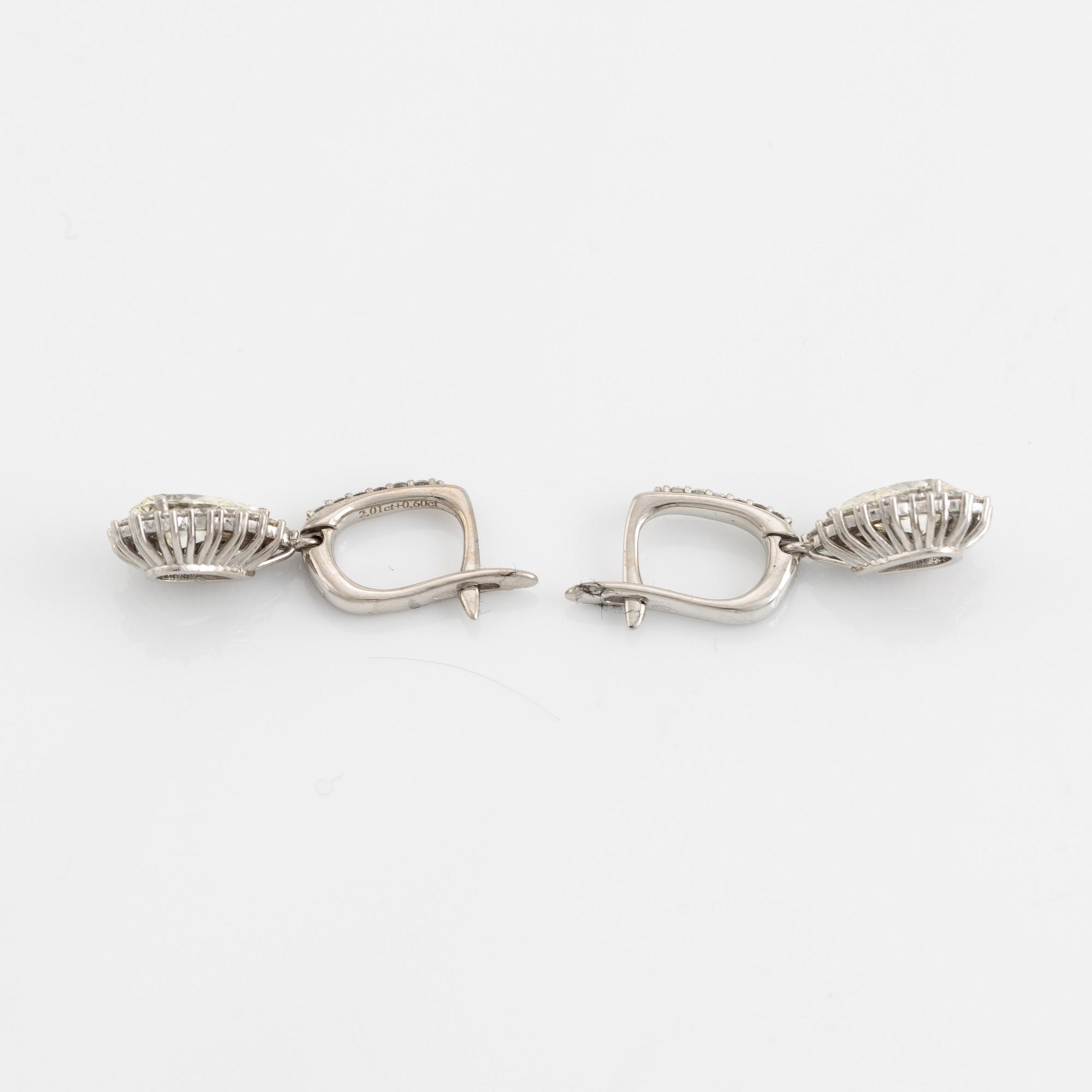 Pear shaped diamond earrings.