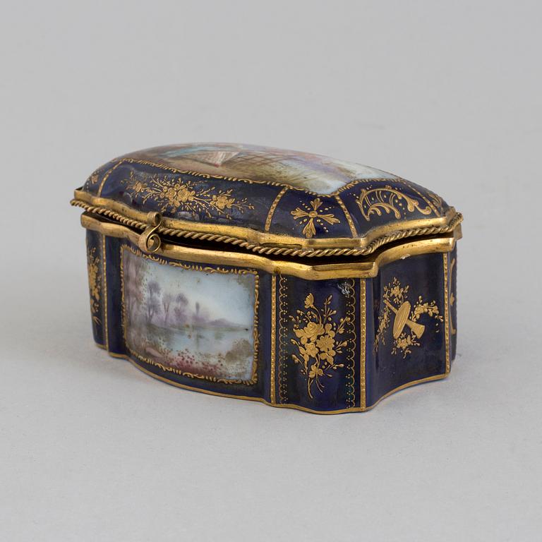 A circa 1900 porcelain box, Meissen style mark.