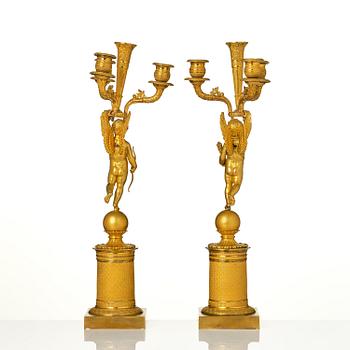 A pair of Empire ormula candelabras.